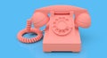 Old pink dial telephone on a blue background. 3d illustration Royalty Free Stock Photo