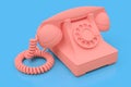 Old pink dial telephone on a blue background. 3d illustration Royalty Free Stock Photo