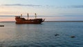 Old pirate ship with tourists sails on the Baltic Sea