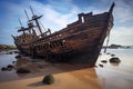 old pirate shipwreck washed ashore on a beach Royalty Free Stock Photo