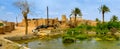 The old pise-walled Iranian village located in a desert part of the country, in the center of the village the big tank for Royalty Free Stock Photo