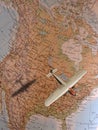 Old commercial flight over a map of America Royalty Free Stock Photo