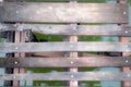 Old planks wood pathway over of canal