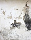 Old plaster wall with cracked plaster and old logs Royalty Free Stock Photo