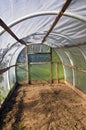 Old plastic grenhouse hothouse in farm