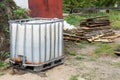 Old plastic water container in a rural building in the garden Royalty Free Stock Photo