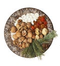 Old plate with nuts, seeds, dried fruits