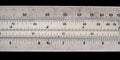 Old pocket slide rule mechanical calculator Royalty Free Stock Photo