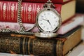 Old pocket-watch and books Royalty Free Stock Photo