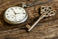 Old pocket watch and chain, vintage locket watch with retro key