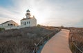 HISTORIC OLD POINT LOMA LIGHTHOUSE AT CABRILLO NATIONAL MONUMENT UNDER BLUE CIRRUS CLOUD SKY AT POINT LOMA SAN DIEGO CALIFORNIA US Royalty Free Stock Photo