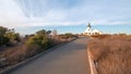 HISTORIC OLD POINT LOMA LIGHTHOUSE AT CABRILLO NATIONAL MONUMENT UNDER BLUE CIRRUS CLOUD SKY AT POINT LOMA SAN DIEGO CALIFORNIA US Royalty Free Stock Photo