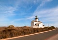 OLD POINT LOMA LIGHTHOUSE UNDER BLUE CIRRUS CLOUDS AT POINT LOMA SAN DIEGO CALIFORNIA USA Royalty Free Stock Photo