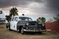 Old police department car parked in radiator springs, it's a Chrysler Royal from 1950