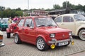 Old Polish private small simple cheap car red Polski Fiat 126p parked Royalty Free Stock Photo