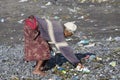 Old poor woman to Bali island. Indonesia Royalty Free Stock Photo