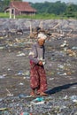 Old poor woman to Bali island, Indonesia Royalty Free Stock Photo