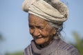 Old poor woman to Bali island, Indonesia Royalty Free Stock Photo