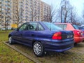 Old classic veteran dark blue Opel Astra 1.8 sedan car parked Royalty Free Stock Photo