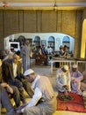 An old popular coffee shop serving tea to customers in the old city of Baghdad