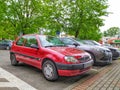 Old popular compact car red Citroen Saxo parked Royalty Free Stock Photo