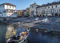 The old port of Arona with colored boat