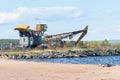 Old port crane on the lake shore