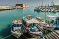 Old port with fishing boats and Venetian fortress of Koules,Castello a Mare in Heraklion, Crete.Panoramic view of the old harbour Royalty Free Stock Photo