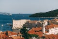 The old port harbor is porporela, near the walls of the old town of Dubrovnik, Croatia. View of the fort on the wall Royalty Free Stock Photo