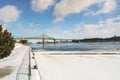 Montreal Frozen St Lawrence seaway with boat and Jacques Cartier bridge