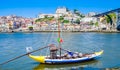 View of Old Porto and traditional boat with wine barrels, Portugal