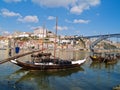 Old Porto and traditional boats with wine barrels