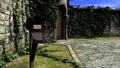Old Post Box in Front of a Traditional house Royalty Free Stock Photo