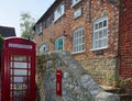 The Old Post Office, post box and red telephone box. Tillington, Sussex, UK.