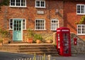 The Old Post Office, post box and red telephone box. Tillington, Sussex, UK.