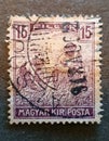 an old postage stamp from Hungary 1917 with the image of some peasants in the field Royalty Free Stock Photo
