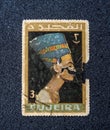 Old postage stamp with Nefertiti. FUJEIRA - CIRCA 1966 Royalty Free Stock Photo