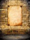 The old poster attached to the coquina wall Royalty Free Stock Photo