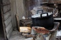 Old pot cooking black using firewood Royalty Free Stock Photo