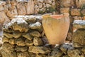 Old pot on an stone wall, archaeological park of Shiloh, Israel