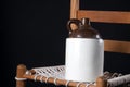 Old Pottery Jug on Chair Royalty Free Stock Photo