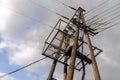 Old power lines on a wooden pole