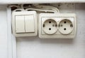 Old power socket and switch on the wall Royalty Free Stock Photo