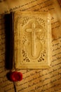 Old prayer book on antique letters Royalty Free Stock Photo