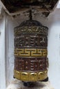 Prayer wheel with mantras at the Boudhanath stupa, Kathmandu, Nepal Royalty Free Stock Photo