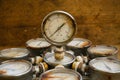 Old pressure gauge or damage pressure gauge of oil and gas industry on wooden background, Equipment of production process
