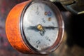 old pressure gauge on the pipeline Royalty Free Stock Photo