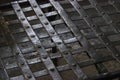 An old prison bed made of forged iron strips, standing in a single cell of the Trubetskoy Bastion prison