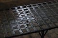 An old prison bed made of forged iron strips, standing in a single cell of the Trubetskoy Bastion prison