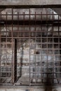 an old prison cell block that has bars and the door is open Royalty Free Stock Photo